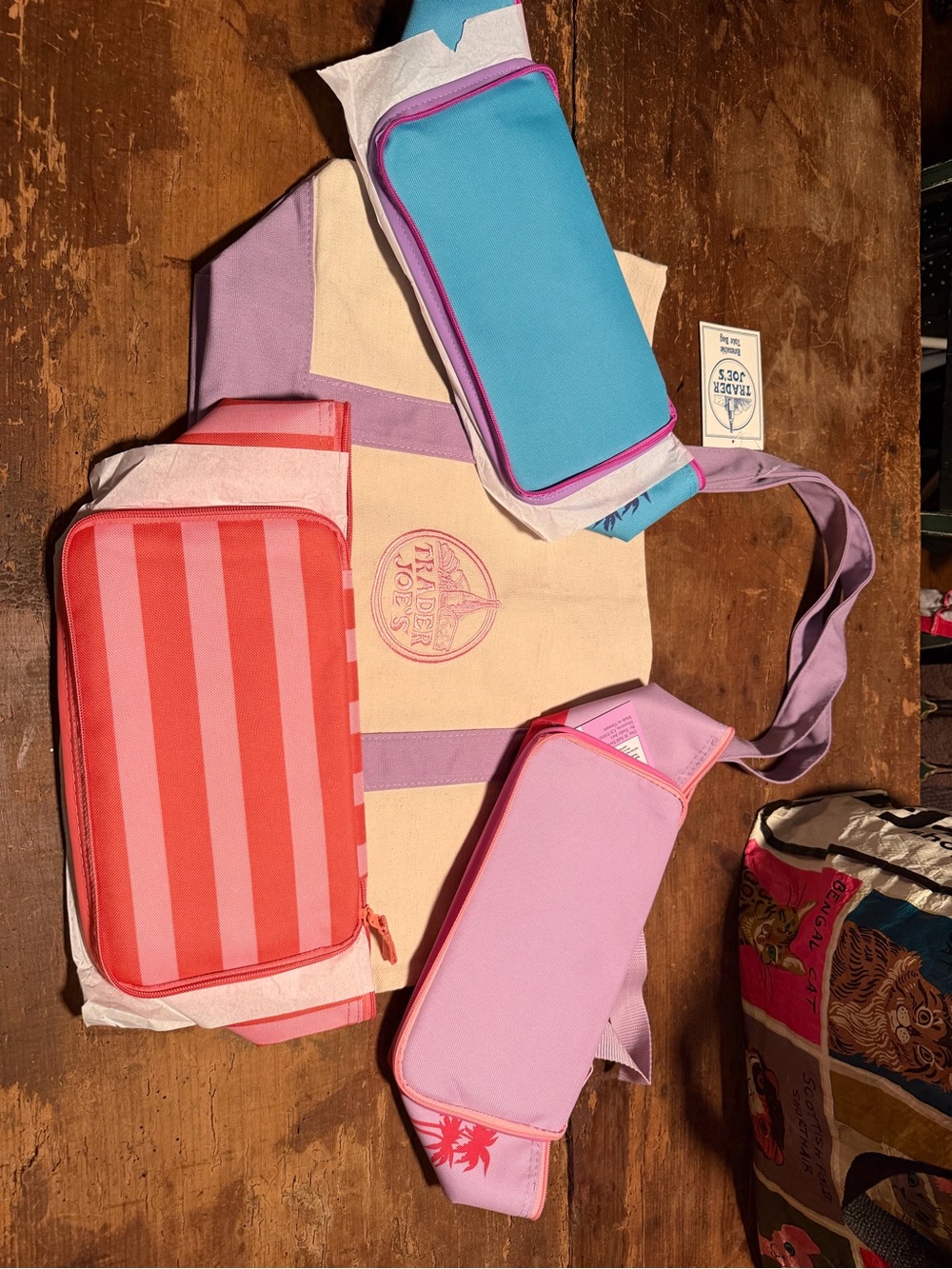 Trader Joe’s 3 mini insulated bags with a large lavender tote bag